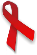 Het rode lint is het symbool voor de internationale bestrijding van hiv en aids