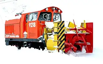 Rhätische Bahn (RhB) sneeuwfrees Xrot et 9218 te Ospizio Bernina