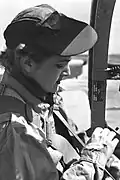 Rina Levinson, in de cockpit van een Fokker S.11 bezig met vluchtvoorbereidingen (1955)