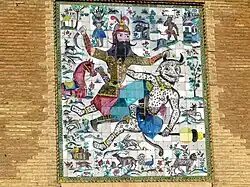 Boven de ingang: Tegelwerk met Rostam die een demoon bedwingt (Perzische mythologie)