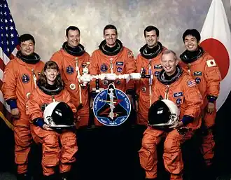 De bemanning van STS-92. Van links naar rechts, vooraan: Pamela Melroy, Brian Duffy; achteraan: Leroy Chiao, Michael Lopez-Alegria, William McArthur, Peter Wisoff, Koichi Wakata