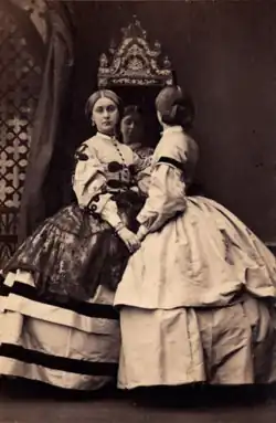 De dames Booth, 1861