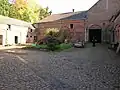 Kasteelhoeve en aanhorigheden van het kasteel Revelingen