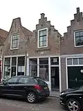 Huis met vernieuwde trapgevel