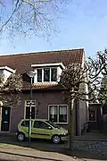 Woonhuis (complex van 20 woningen)