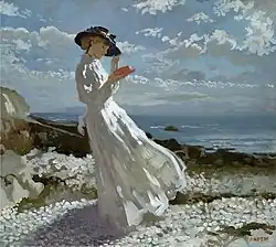 Grace reading at Howth Bay, ca. 1910