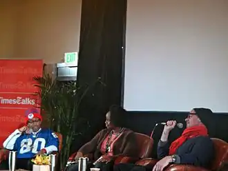 Dee Rees (midden) met Spike Lee (links) in 2012.