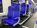 Interieur 2e klas met stoeltype Fainsa Sophia.