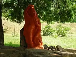 Het Yaksha-reliëf bij Bharhut tijdens een aanbidding als Hanuman door lokale dorpelingen