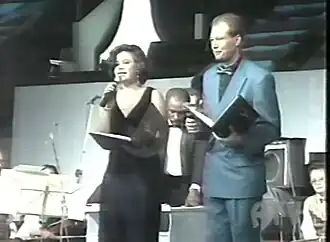 Presentatoren Sharma Chin A Foeng en Henk van Vliet