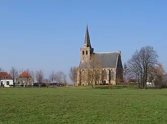 Poldergebied met kerk 't Woudt