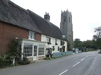 Kerk en pub in Ingham