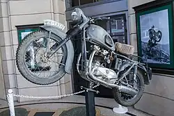 De TR6C Trophy vermomd als Duitse motorfiets, gebruikt door Bud Ekins en Steve McQueen in The Great Escape. Om de machine "ouder" te maken was een voorspatbord van een Speed Twin gemonteerd.