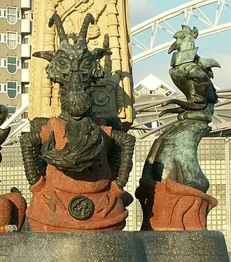 Toondermonument in Rotterdam, met links een impressie van prof. Joachim Sickbock (rechts de markies de Canteclaer)