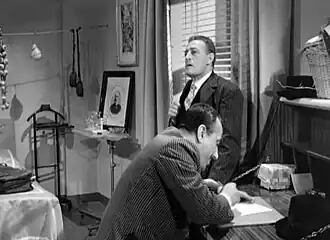 Totò en De Filippo in de scène van het schrijven van de brief