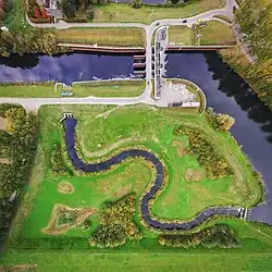 Vispassage in de Dieze bij spuisluis Crèvecoeur