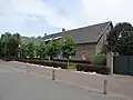 Voormalige boerderij (woonhuis en schuur)