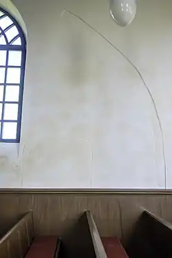 Restant van een muraalboog van de oorspronkelijke kerk