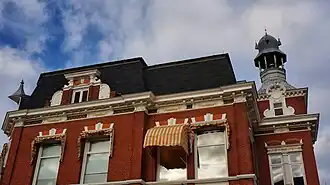 alt=Het hoofdkantoor was gevestigd in een rijksmonument in de Wierdensestraat. Informatie over rijksmonumentnummer 507693