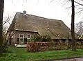 Hallenhuisboerderij met middenlangsdeel