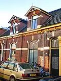 Woonhuis Woningbouwcomplex Eigen Haard 1894 in neorenaissancestijl